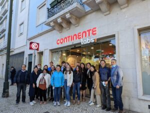 Students stand in front of the Continente store in Portugal