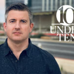 Headshot of Shawn Driver with the 10 Under 10 graphic identifier overlaid on the photo's background.