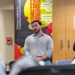 Image of Rob Karp ’19 speaking to Air & Sea Club students