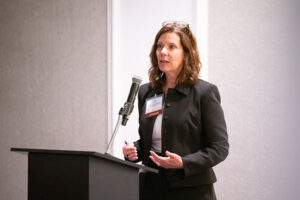 Image of Camille Carlstrom delivering the keynote speech.