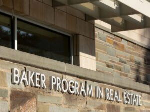 Baker Program in Real Estate (BPRE) sign on the front of the Statler Hall building.