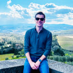 Louis Guzzo, MPS ’23, posing at Castello di Brolio—the family home of the Baron Francesco Ricasoli, who owns Ricasoli Winery, founded in 1141
