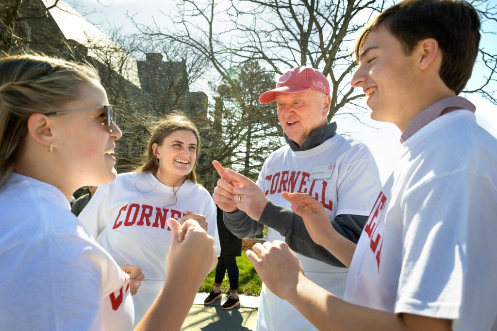 Andrew Karolyi Charles Field Knight Dean Cornell SC Johnson College of Business with students