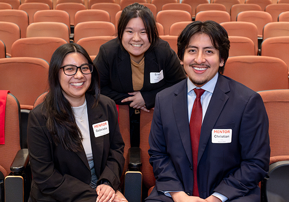 Three Accelerator Scholars in Statler auditorium.