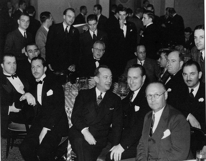 Black and white group photo of men in suits.