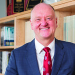 Headshot of Andrew Karolyi