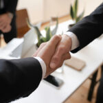 Image of two male hands shaking in agreement