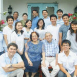 Chris Lasa and his stepmother’s family in their annual family photo