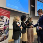 investing pitch competition judges shaking hands with participants