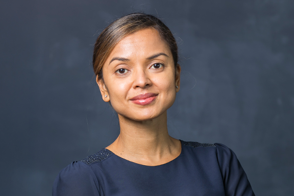 Headshot of Michelle Dugid.