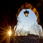 Looking out from Sage Hall with the sun peeking through the doorway.