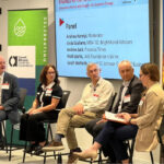 Panel of speakers at event