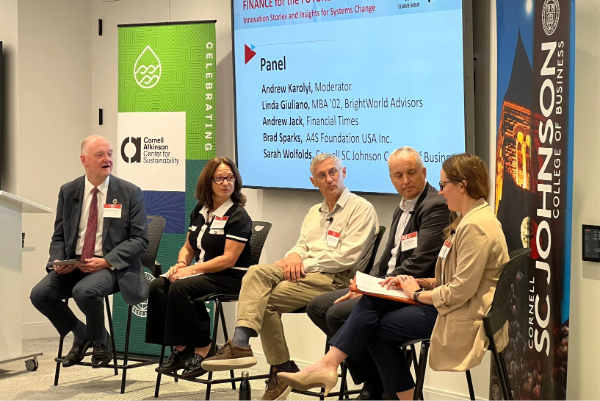Panel of speakers at event