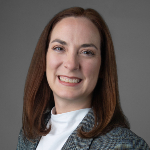 Headshot of Brenna Farmer.