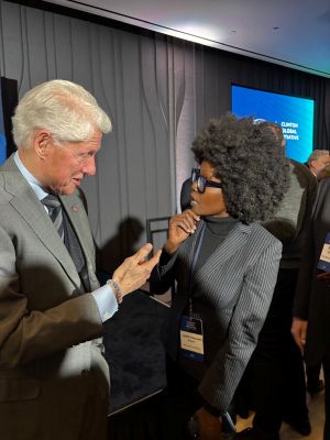 Lydiah Bosire and former president Bill Clinton talking