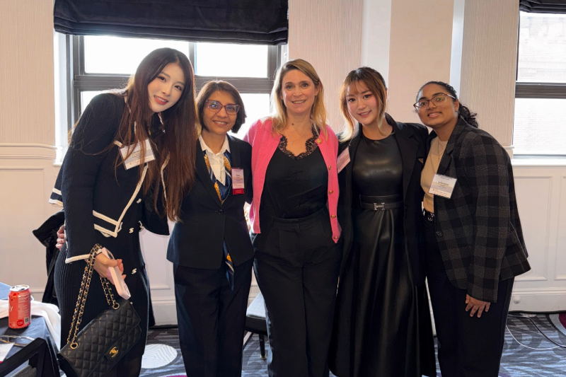 Five women in business attire