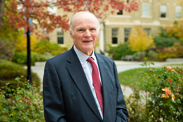 Stephen Ashley posing outside on the Cornell campus
