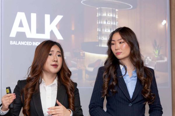 Katelynn Wiseman and Miya Deng, seniors in the Nolan School of Hotel Administration, present their startup, ALK.