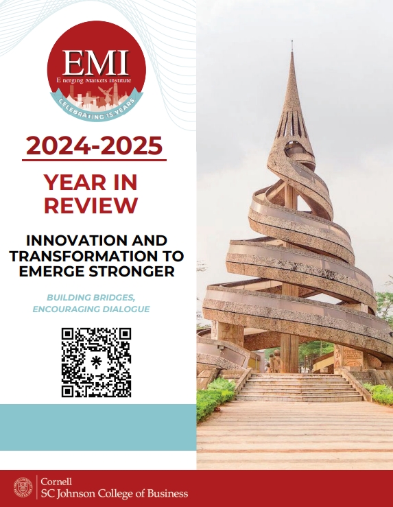 Cover of the EMI 2024–2025 Year in Review featuring the EMI 15th anniversary logo, the title ‘Innovation and Transformation to Emerge Stronger,’ a QR code, and an image of a spiraling architectural tower on a landscaped path.