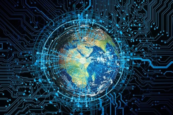 Digital illustration of Earth surrounded by glowing blue circuitry patterns, symbolizing global connectivity and technology networks.