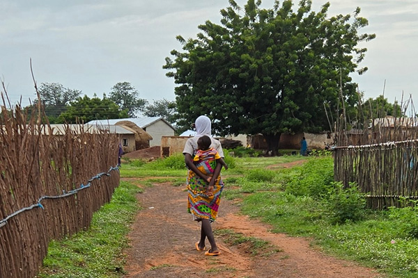 A woman and child in rural Ghana, where high rates of anxiety and depression are quietly shaping the labor market