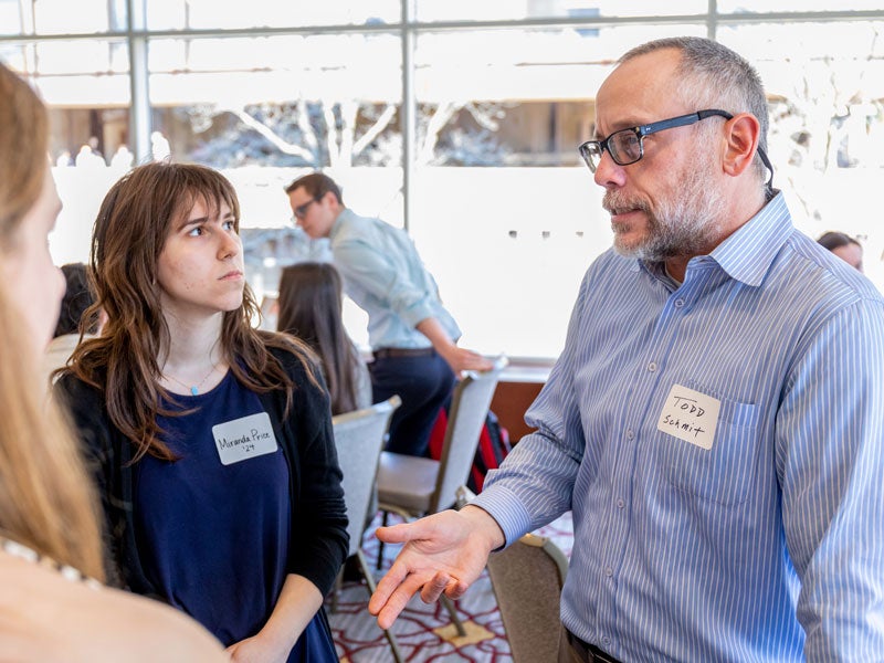 Dyson School faculty Todd Schmit speaks to students