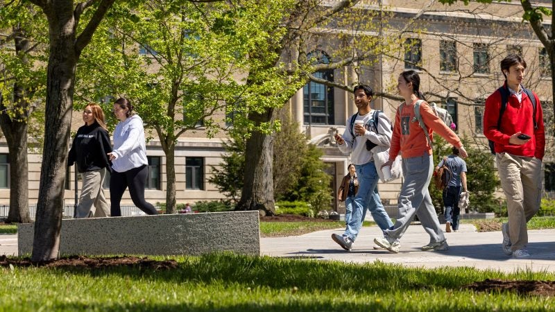 warren hall with students walking out front on Ag Quad