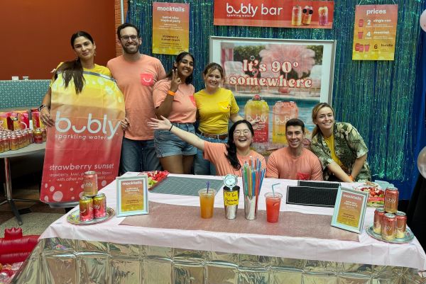 Zachery Badrawi, MBA ’27, second from right, with his teammates during the Battle of the Brands case competition hosted by the Corporate Leadership Club