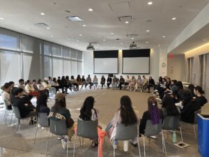 Students seated in a circle