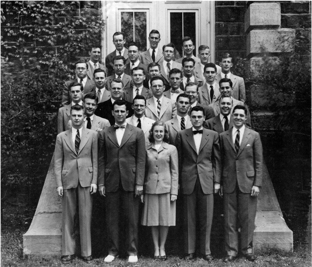 Black and white photo Jane Stevens, first female MBA student, with her male classmates