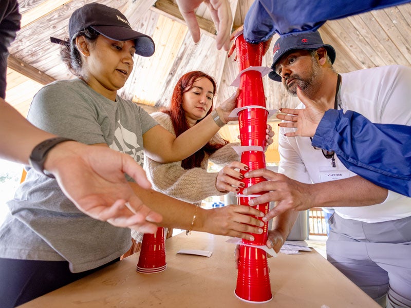 Students experience Johnson Outdoor Experience solving problems together