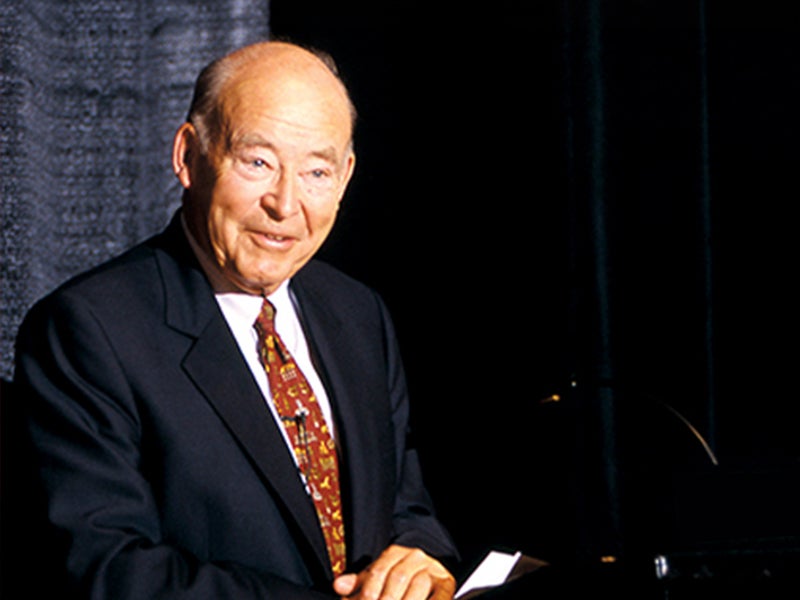 Samuel Curtis Johnson speaking on a panel.