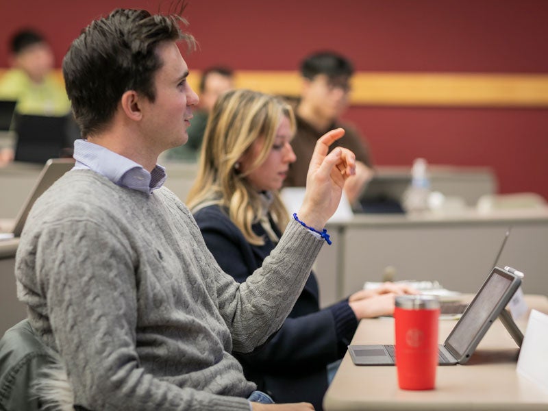 MMH student raises his hand during class