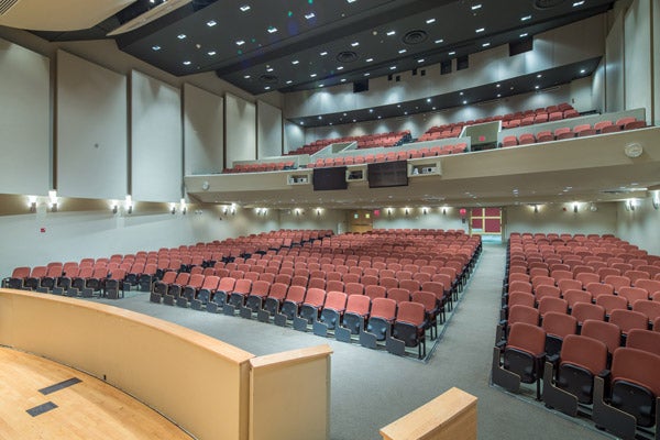 Wide view of Alice Statler Auditorium showing main floor and balcony seating from the stage