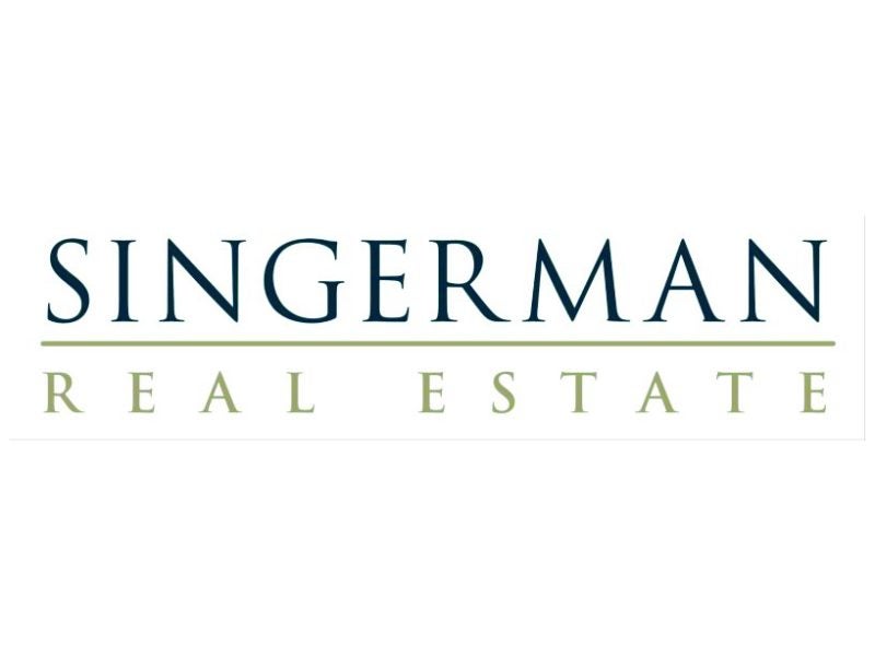 Sigerman Real Estate logo.