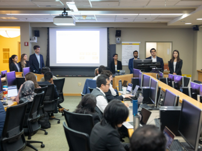 Image of the financials team presenting to the Cayuga Fund class.