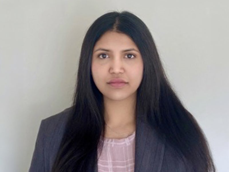 Headshot of Rhea Iyer.