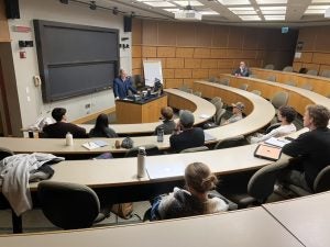 Students attend a lecture  in Sage Hall.
