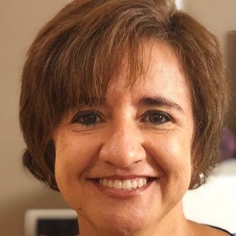 Headshot of Maria Camarero.