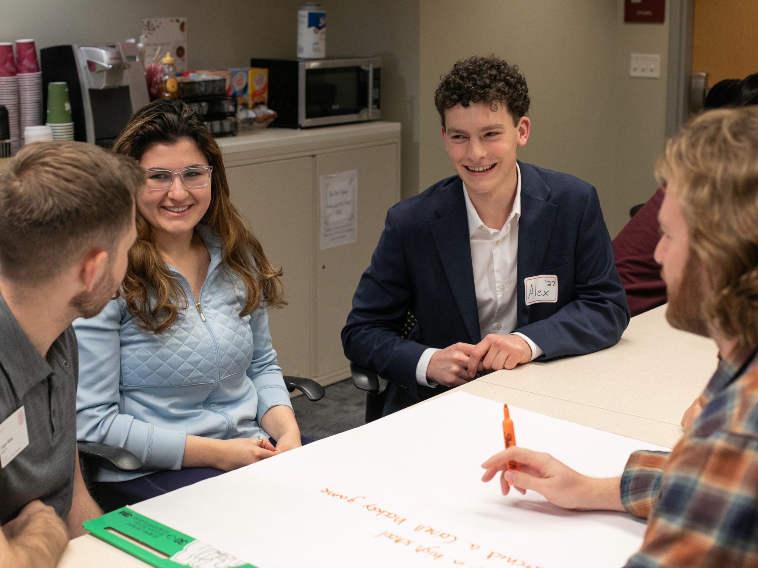 Undergraduate and graduate students connect in PIHE suite to &ldquo;Break the Ice&rdquo;.