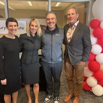 Kim Hehir surrounded by family and friends at the Family Business event