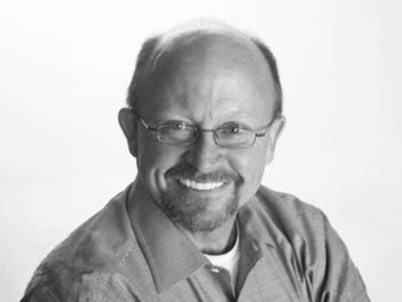 Headshot of Greg McCann.