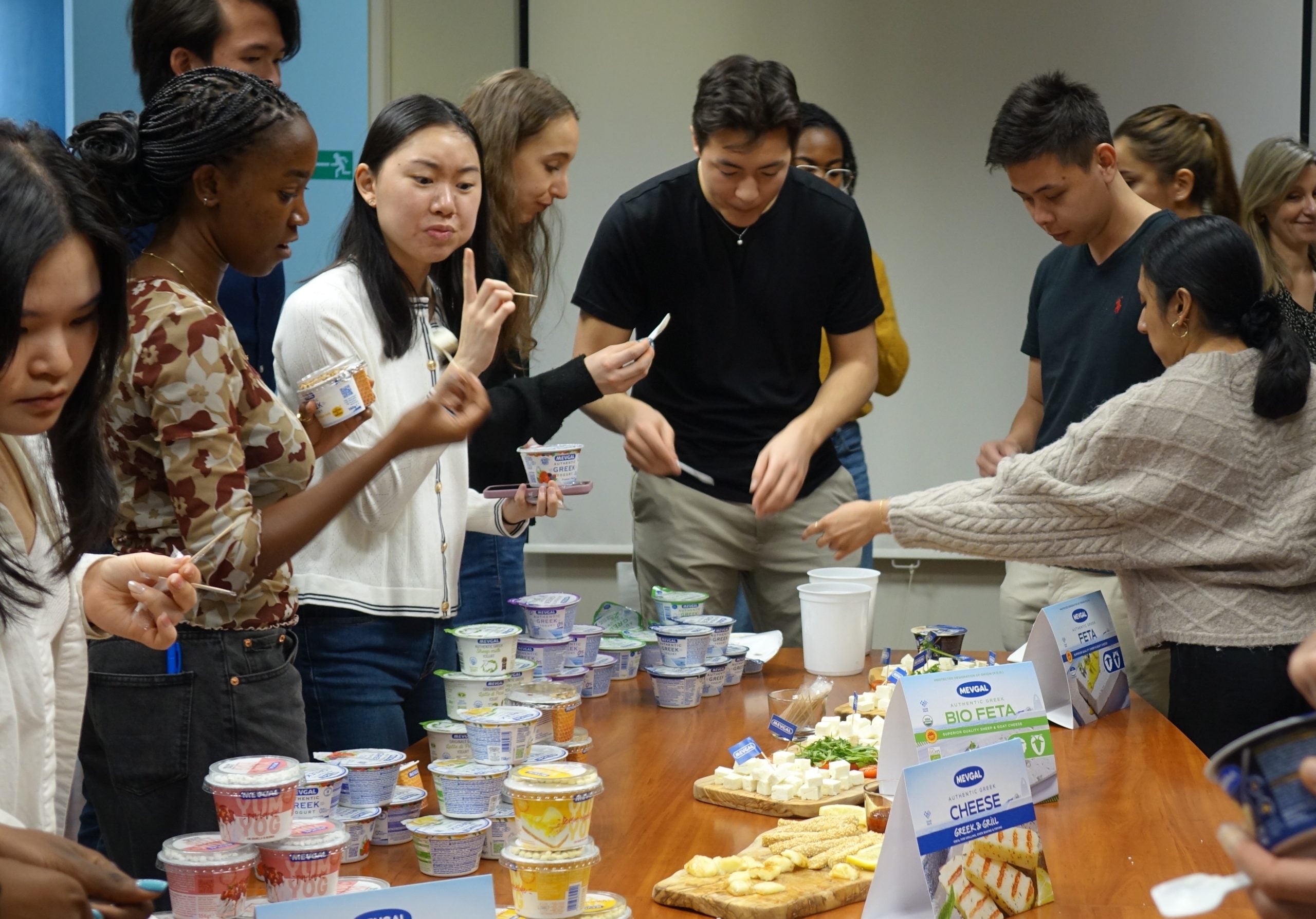 Students sampling MEVGAL products.