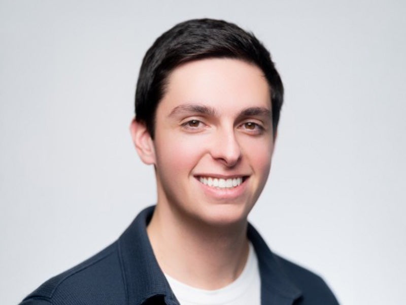 Headshot of Max Mandell.