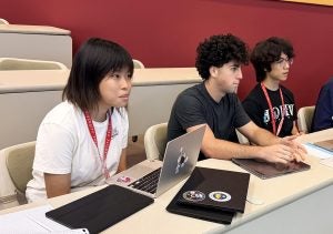 A group of high school students in a classroom.