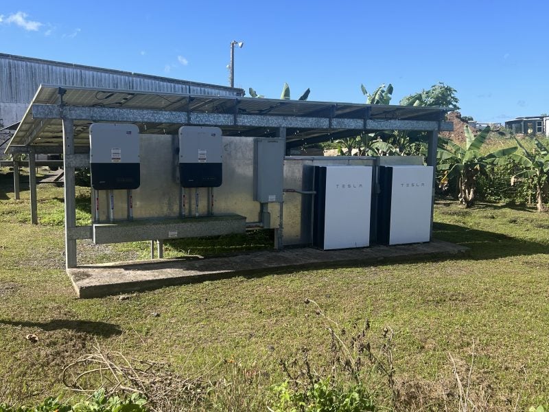 Two white Tesla Powerwall generators.