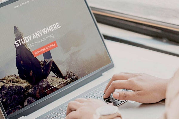A person browses Cornell executive education options
