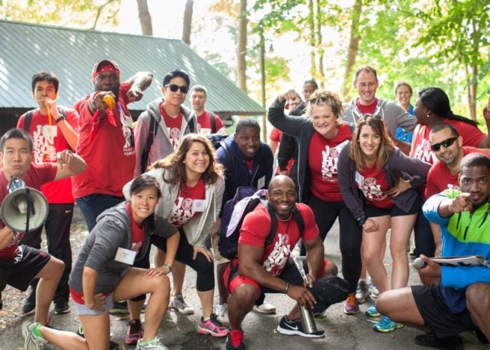 A group of new Cornell students in boisterous candid shot.