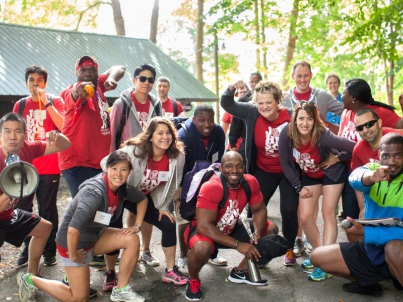 A group of new Cornell students in boisterous candid shot.